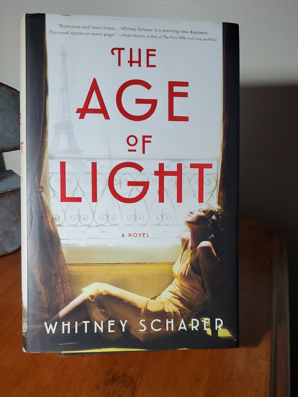 The Age of Light by Whitney Scharer - Red & Cream Paperback